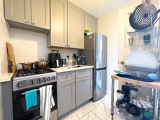 1st image of 128 Thompson St APT 19A