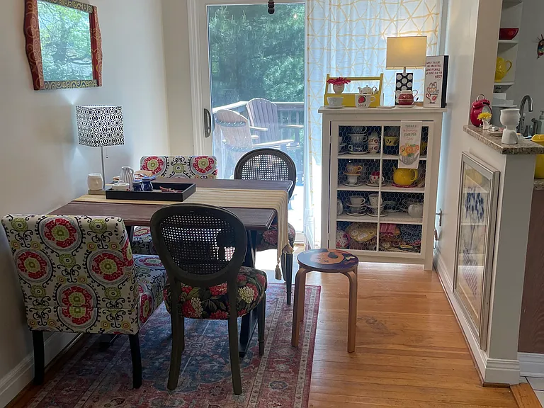 The sliding doors lead to the outdoor deck. Off to the right is the kitchen.
