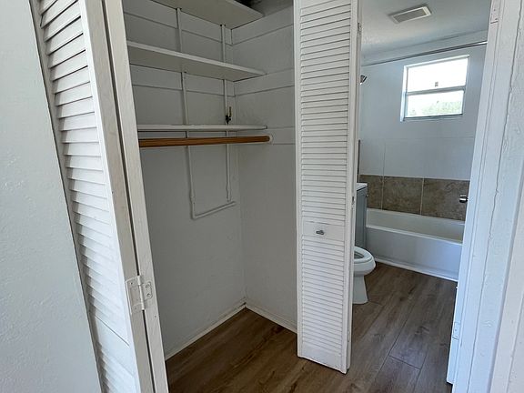 Hallway closet and bathroom entrance.