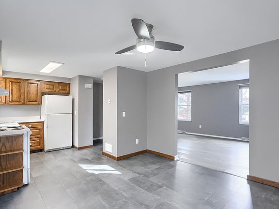diningroom features a new overhead lighted LED fan and new flooring
