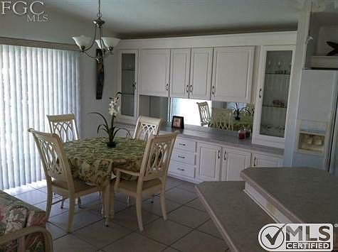 Dining Area with view of water and pool.