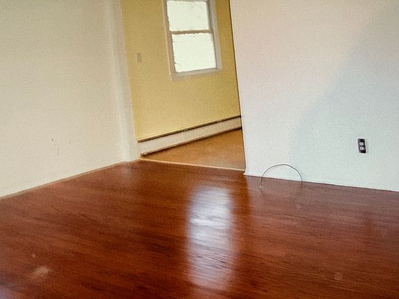 Large living room/ hardwood floors. Great closet space!