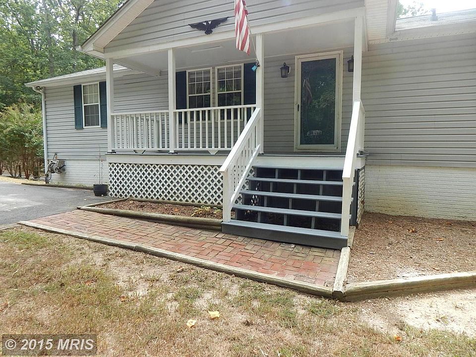 Brick Sidewalk and Covered Front Porch