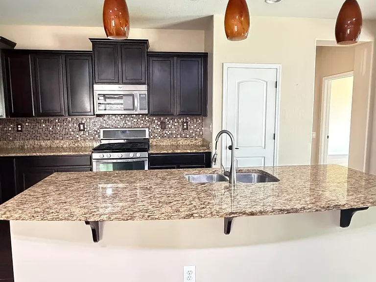 10786 W Yearling Rd — Photo 9