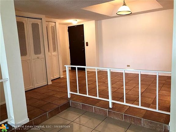 Entrance to apartment and dining area