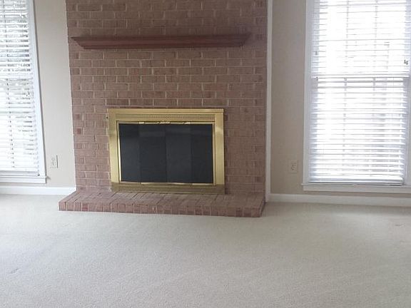 Den with gas fireplace