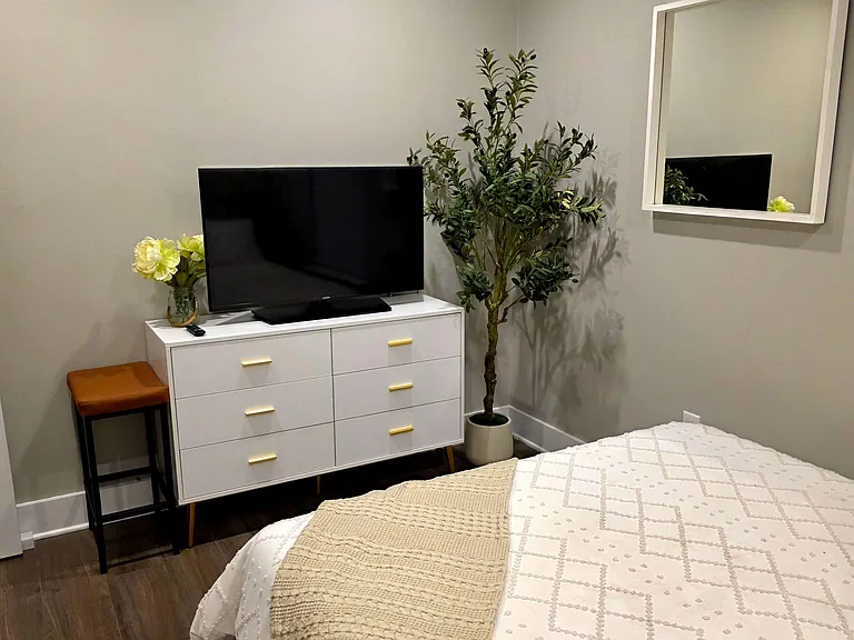 Dresser and private TV included
