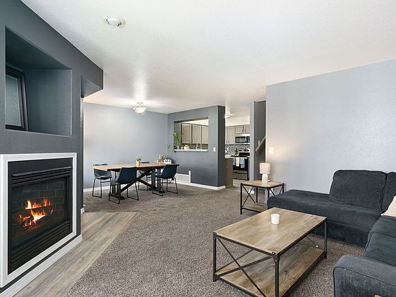 Living room toward dining and kitchen