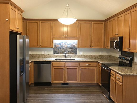 Spacious remodeled granite kitchen.