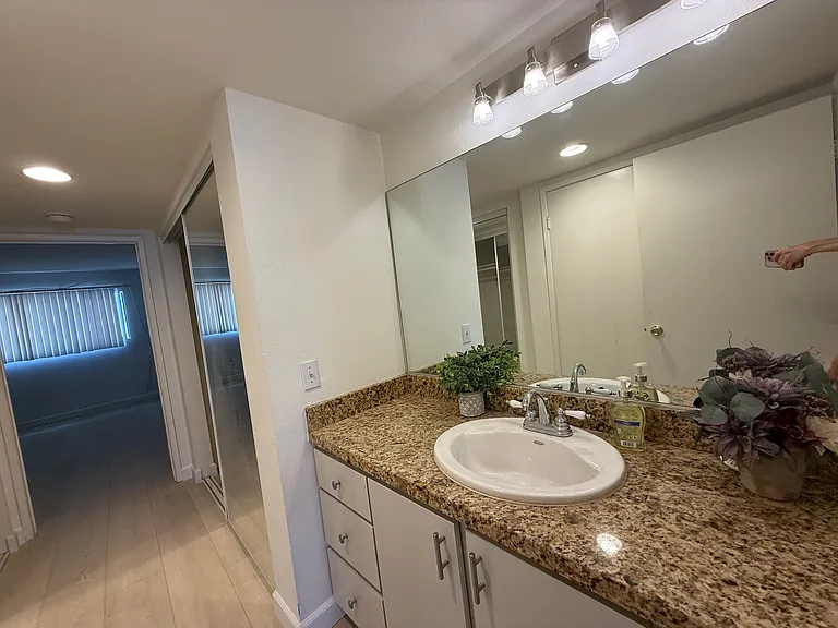 2nd bedroom with granite counter top sink