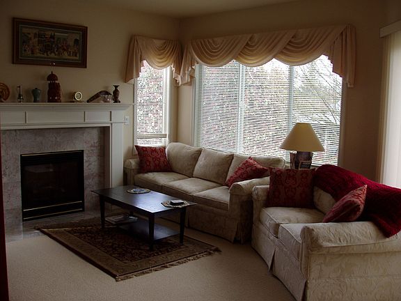 Custom window treatments throughout house.