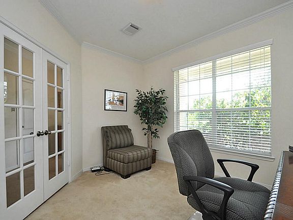Study/formal living with double french door.