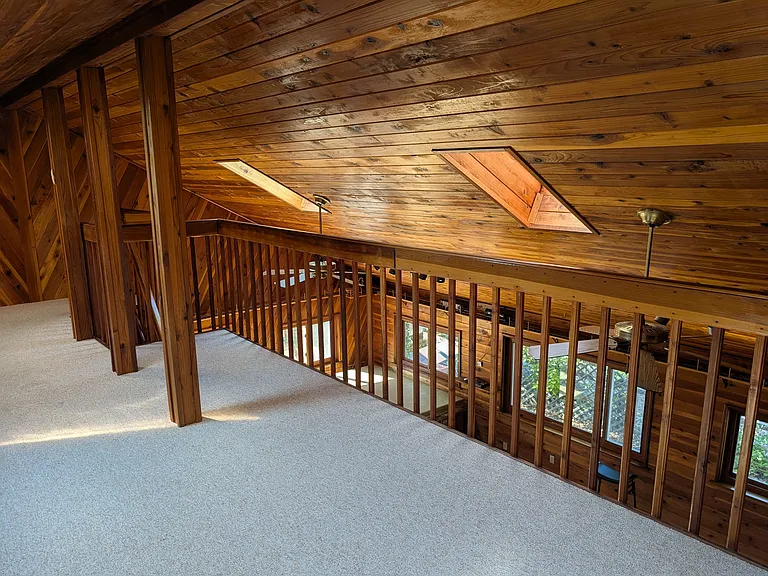 loft with two whole house fans for quick cooling/air flow to reduce need for AC