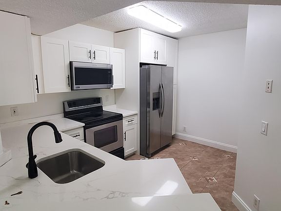 3rd image of 8721 Wiles Rd APT 302