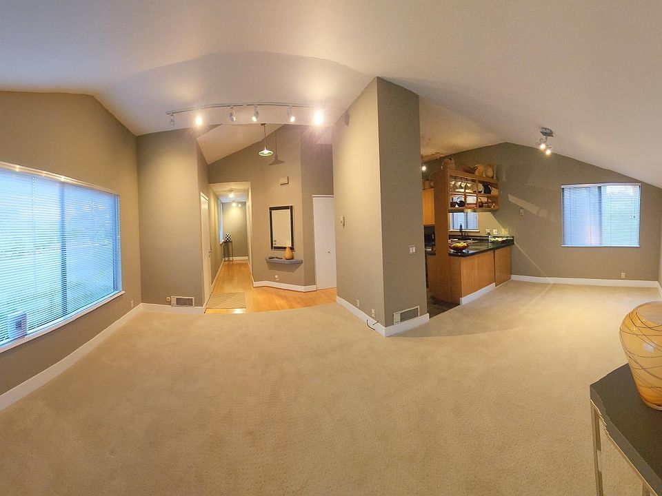 Wide angle living, dinning and entry area