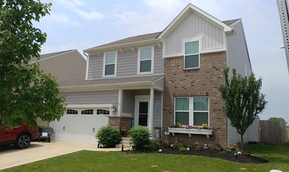 EXTERIOR FRONT. BEAUTIFULLY LANDSCAPED LAWN IN FRONT AND BACK.