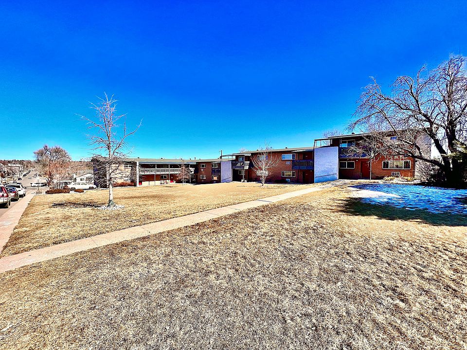 Explore the tranquility of suburban living with this charming apartment complex nestled in nature.