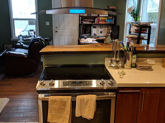 Main living area shown in background.