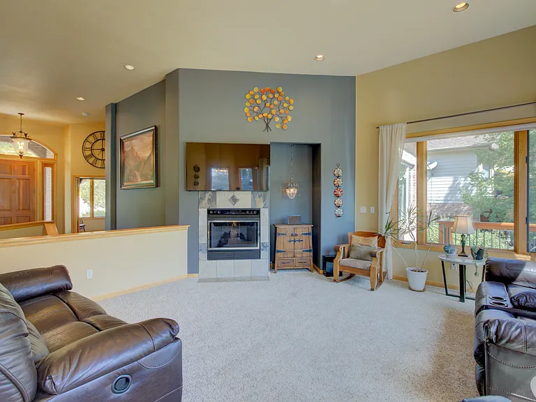 Main level family room with gas fireplace.
