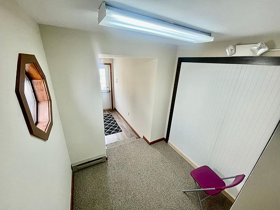 Entrance to the apartment that is clean and welcoming