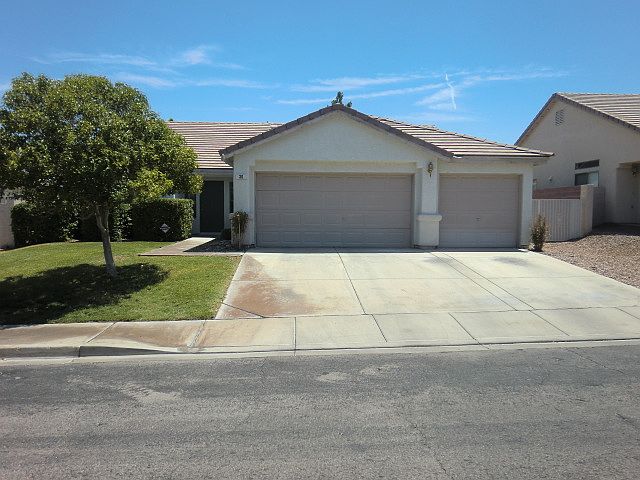FRONT WITH 3 CAR GARAGE
