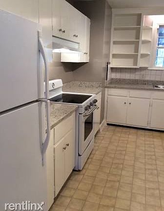 Newly updated kitchen with granite countertops, new range an