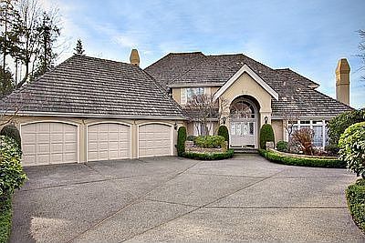 A long private drive leads to this magnificent home