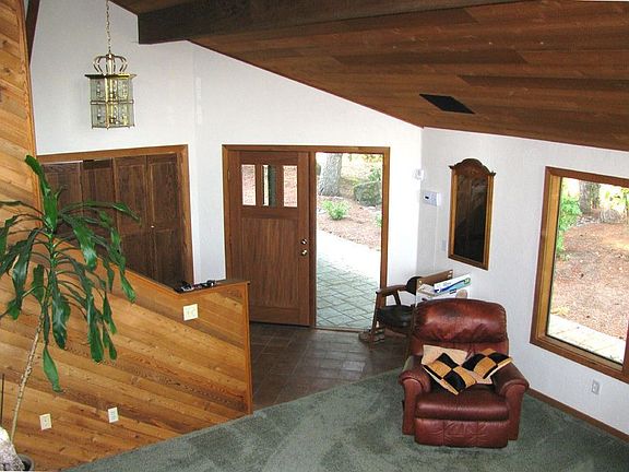 Spacious, rustic vaulted living room