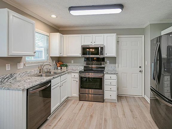 Granite counter tops, Kitchen, Stove, Microwave, Refrigerator