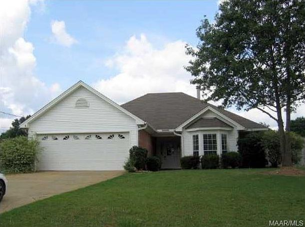 Street view of home. Tree died, was removed, and will be replaced during fall's cooler weather.