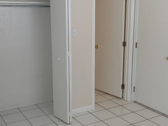 Downstairs bedroom has private bath entry