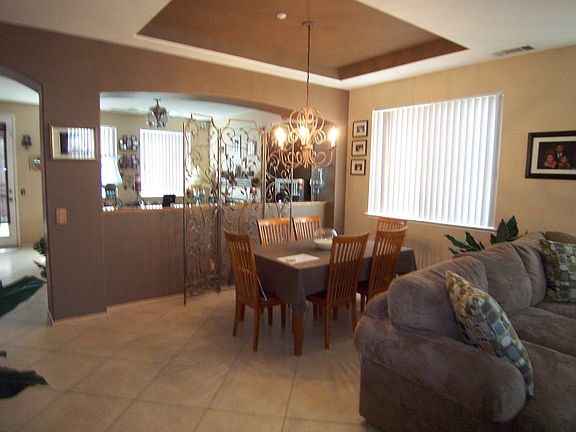 Sensational formal dining room perfect for entertaining guests! 