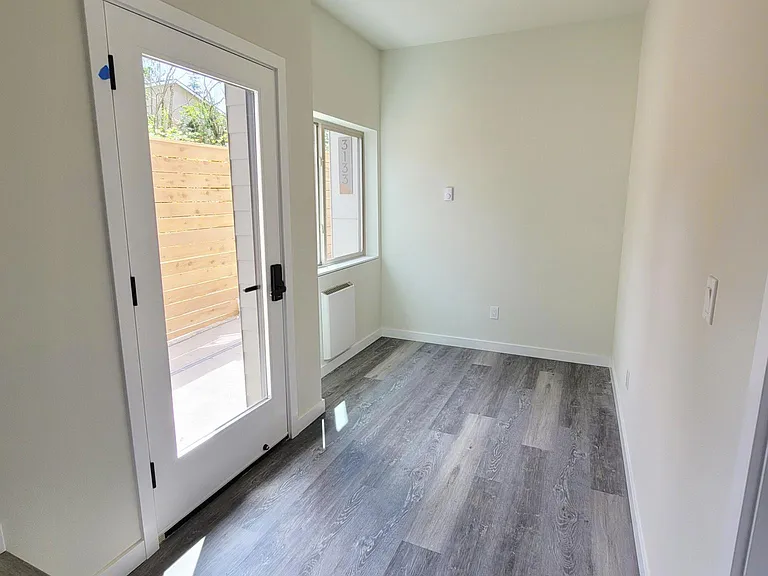 Entry level a flexible office space with attached 2 car garage.
