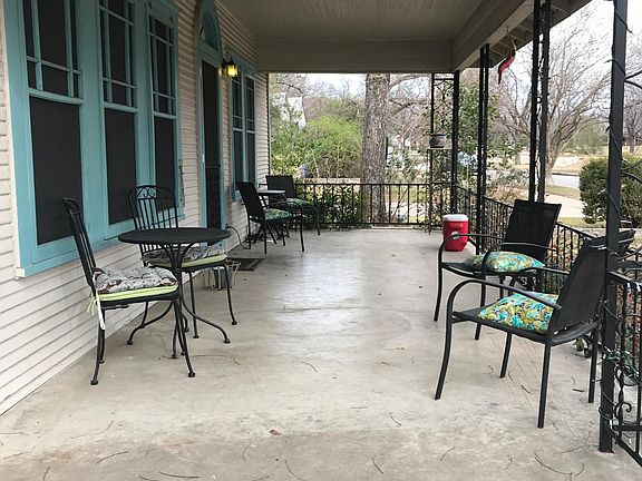 Very large covered porch with view of all three blocks of pa