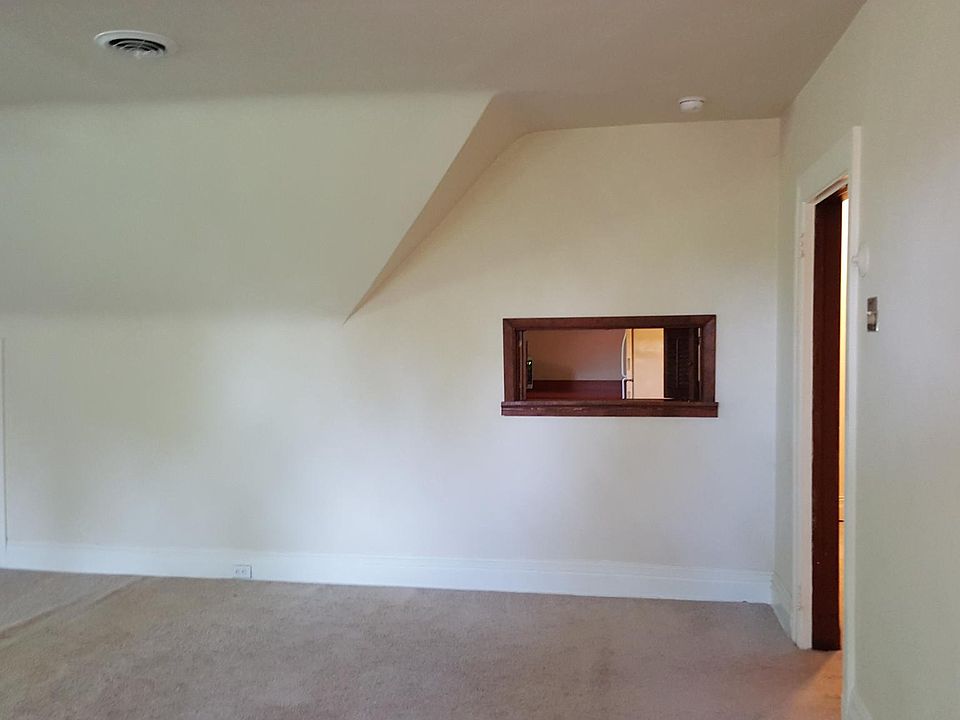 Great room offers a pass through the kitchen.