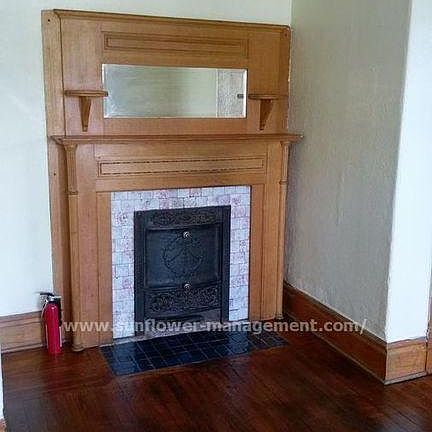 Beautiful vintage fireplace - decorative only!! The pictures say "Sunflower Management" - I'm not using their services anymore!