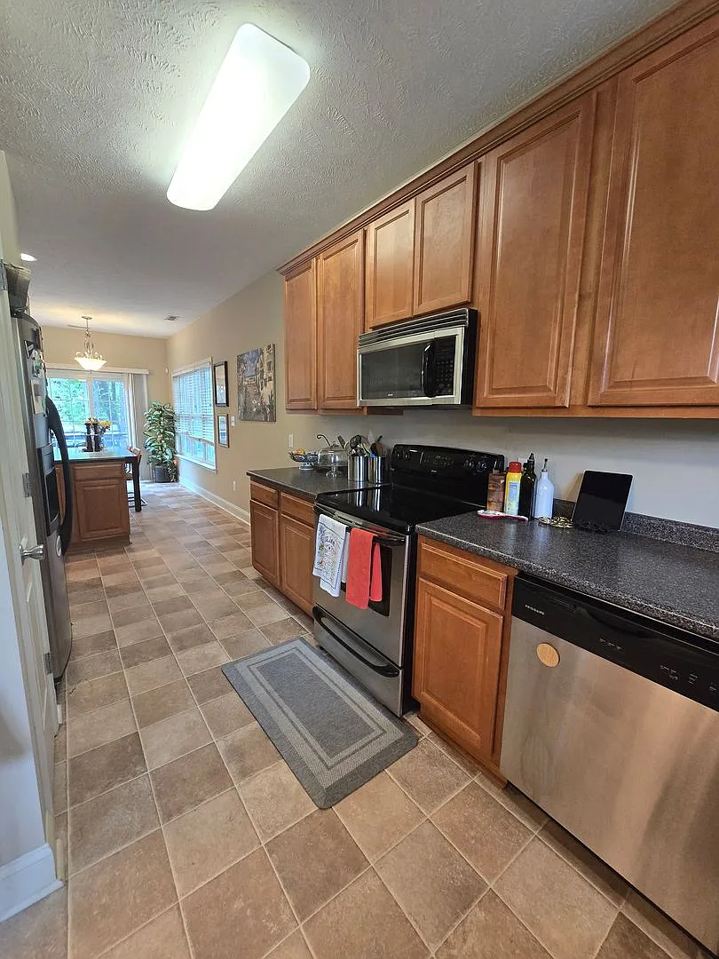 Price Reduced- 4 Bedroom, 3 Bath Home Located In Carolina Lakes - Community Pool Access! — Photo 3