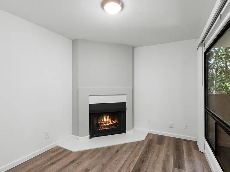 Cozy up in front of the fire in your den. All floor plans include a wood burning fireplace.