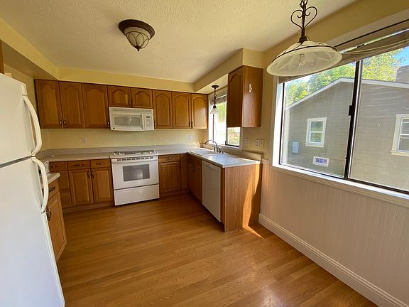 Kitchen hard wood floors and natural 
light