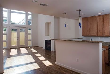 Actual counter top is darker ubatuba with cherry stained cabinets