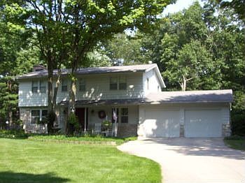 Welcome to this beauty of a two story home on approx 34 an acre of Beautification Award wining lands