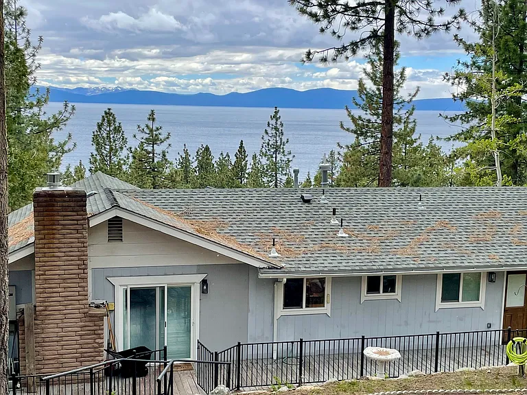 View of Lake Tahoe and west shore from fenced and terraced back yard