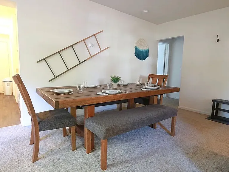 Spacious living area with flexible space for both living and dining setups.