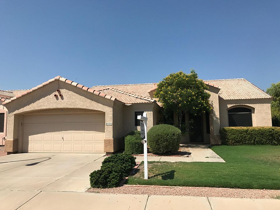 Street View - 2-car garage, neatly landscaped front-yard.
