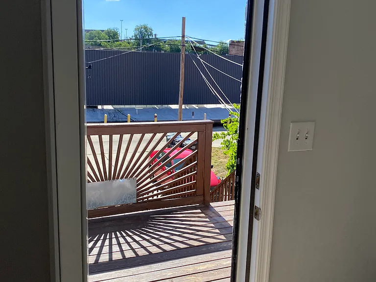 step on to your private rear deck with a view into the distance