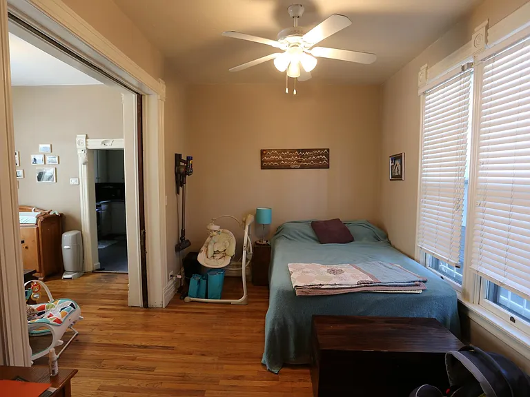 Spare room / office / bedroom with hardwood floors