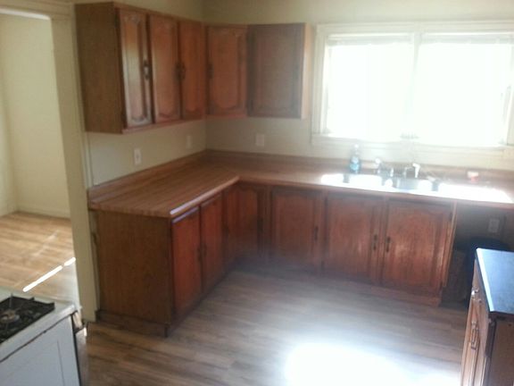 Larger kitchen with new flooring & dishwasher