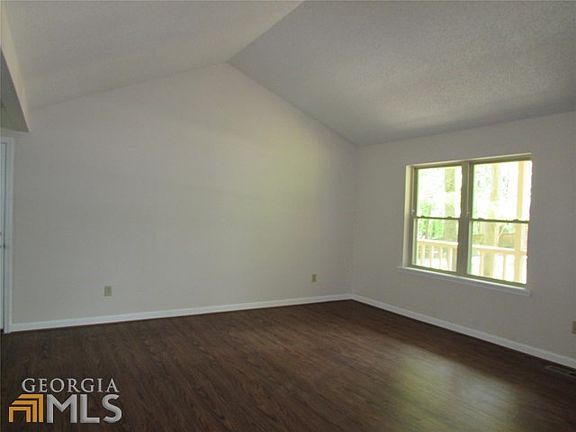 Open Plan family room with vaulted ceiling