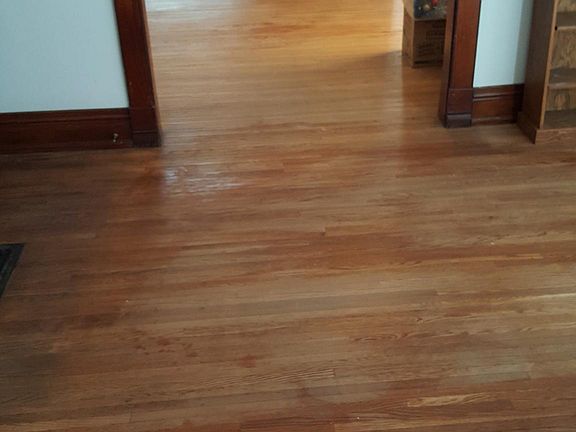 Hardwood floors throughout dining room, living room and den!