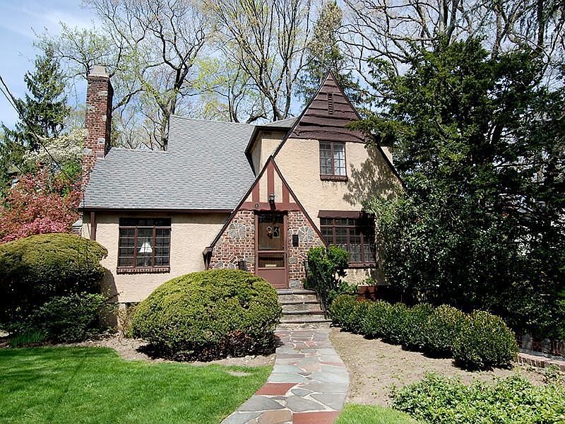 Inviting Tudor on Park-like Grounds